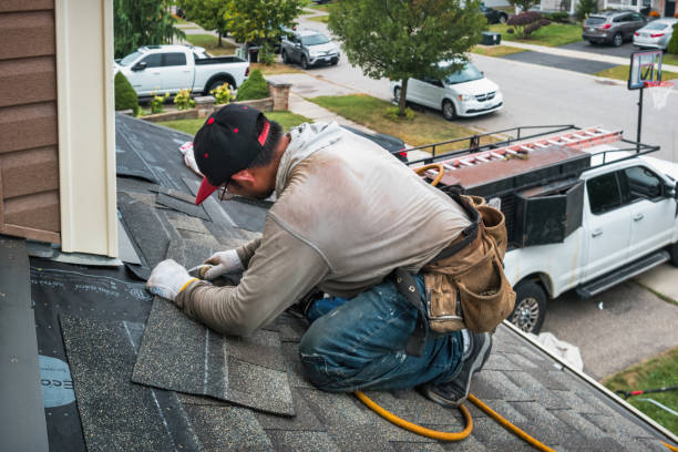 Professional Roofing technician working in Lewisville, OH